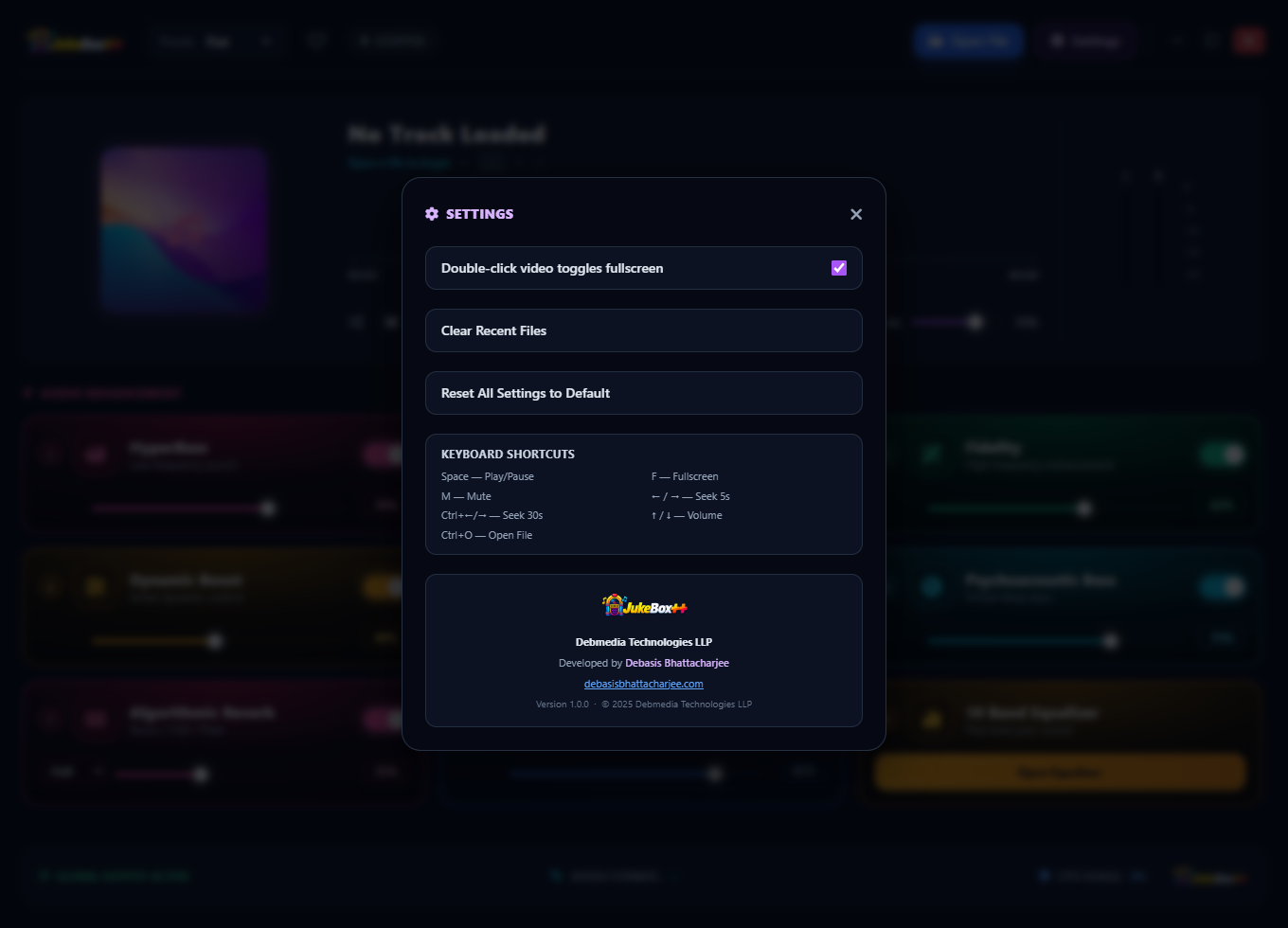 JukeBox++ Settings and About dialog showing keyboard shortcut configuration, application information including Debmedia Technologies LLP, and utility buttons for clearing recent files and resetting settings